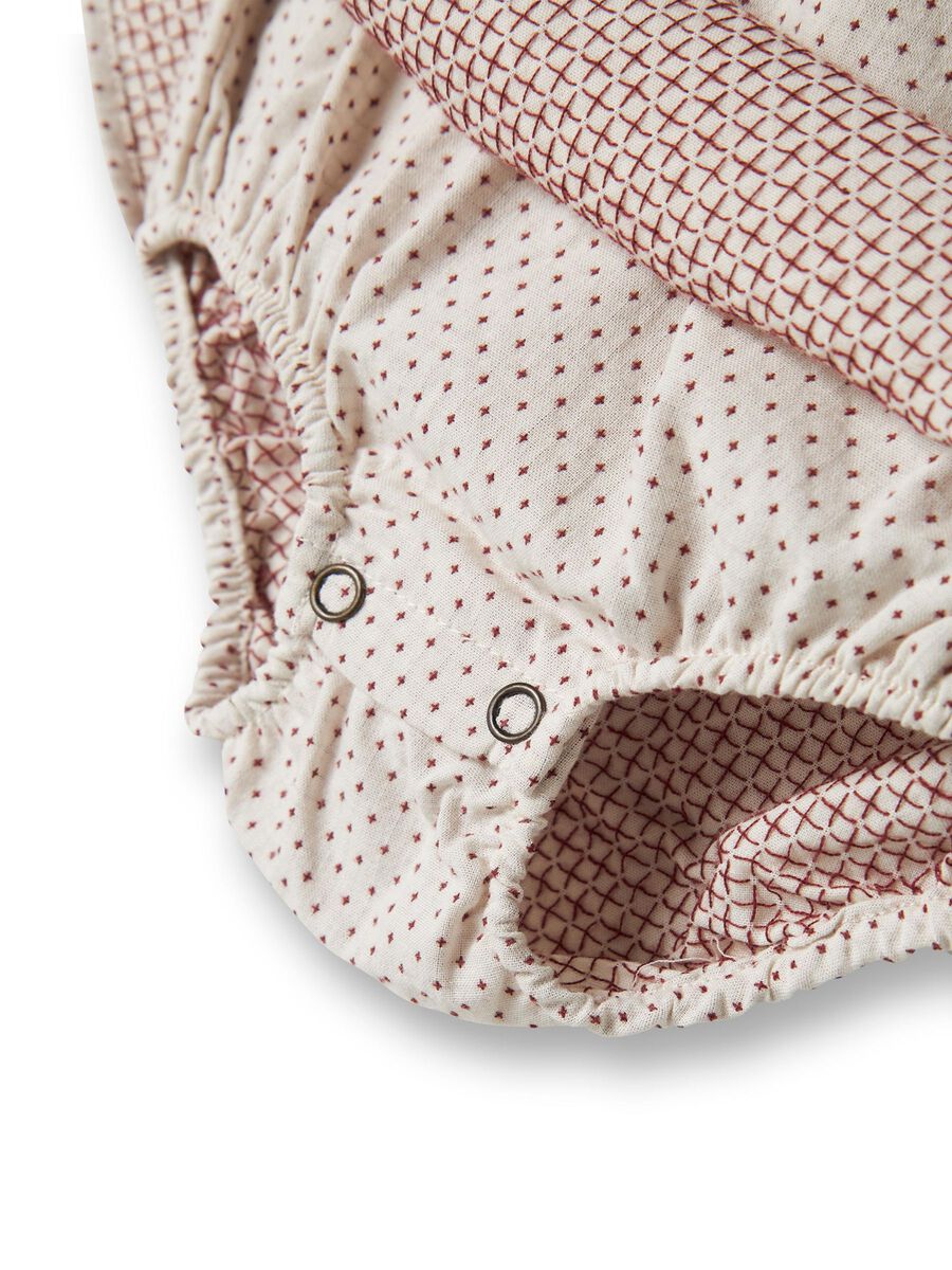 Gepunktetes Bodykleid mit Einsatz von Lil' Atelier drei Knöpfen und einem Kragen aus bio-baumwolle- Detailansicht Bodyeinsatz