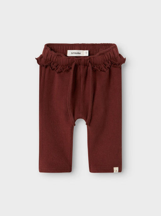 rotbraune stoffhose für babys und kleinkinder mit rüschenbund von lil atelier aus bio baumwolle - vorderansicht
